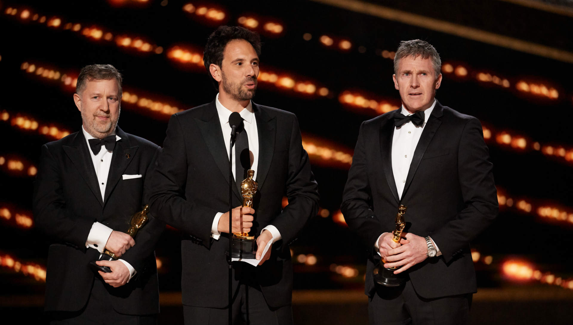 Greg Butler, Guillaume Rocheron, and Dominic Tuohy sur la scène des Oscars 2020 